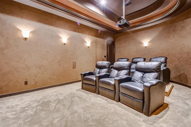 a kitchen with granite countertop white cabinets and sink