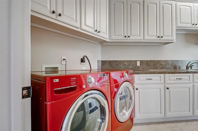 a balcony with wooden floor and fence