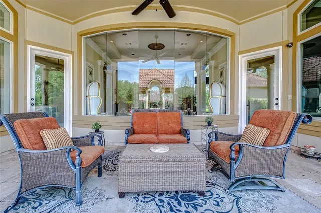 a view of a house with a yard and a fountain