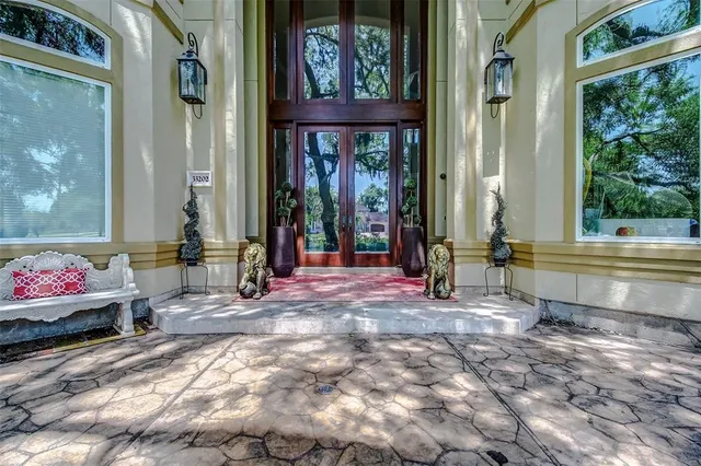 a room with a work space and a couch