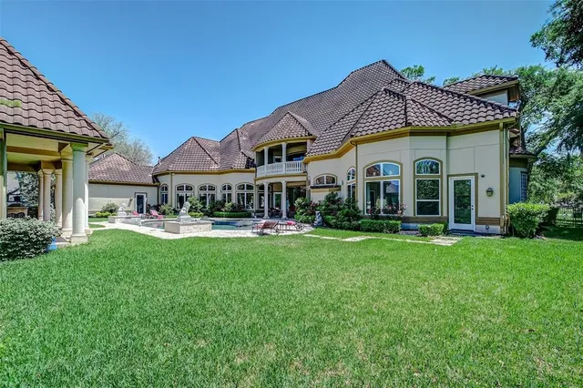 a front view of a house with swimming pool