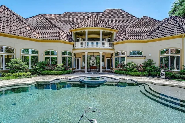 a kitchen with a sink and a counter top space