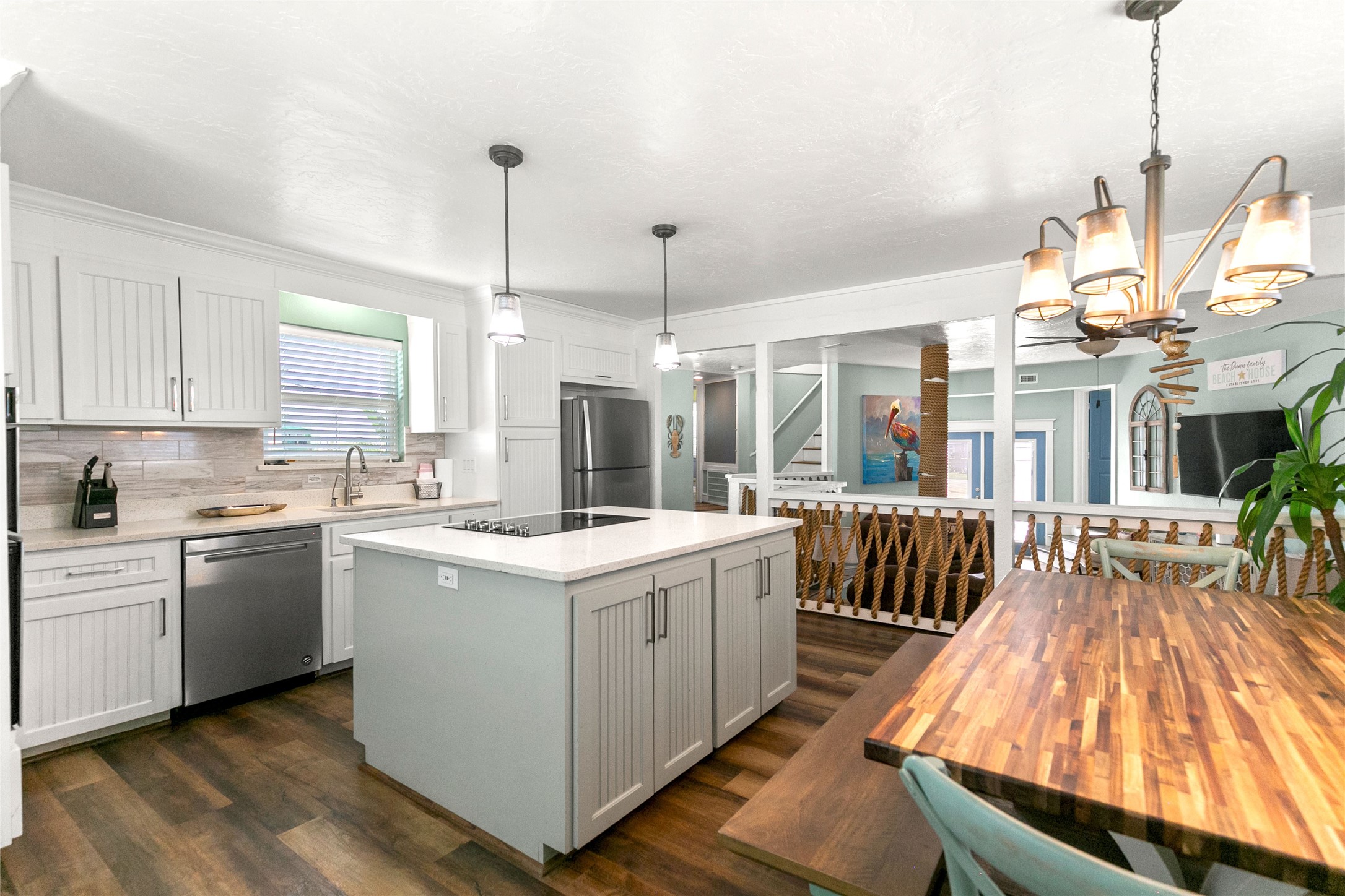 319 Pompano Lane Surfside Beach, TX 77541 - Photo 11 of 48 a kitchen with sink stove and refrigerator