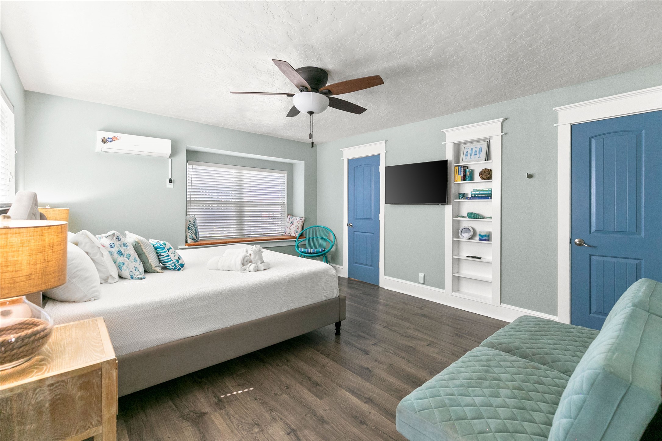 319 Pompano Lane Surfside Beach, TX 77541 - Photo 15 of 48 a bedroom with a bed and a flat screen tv