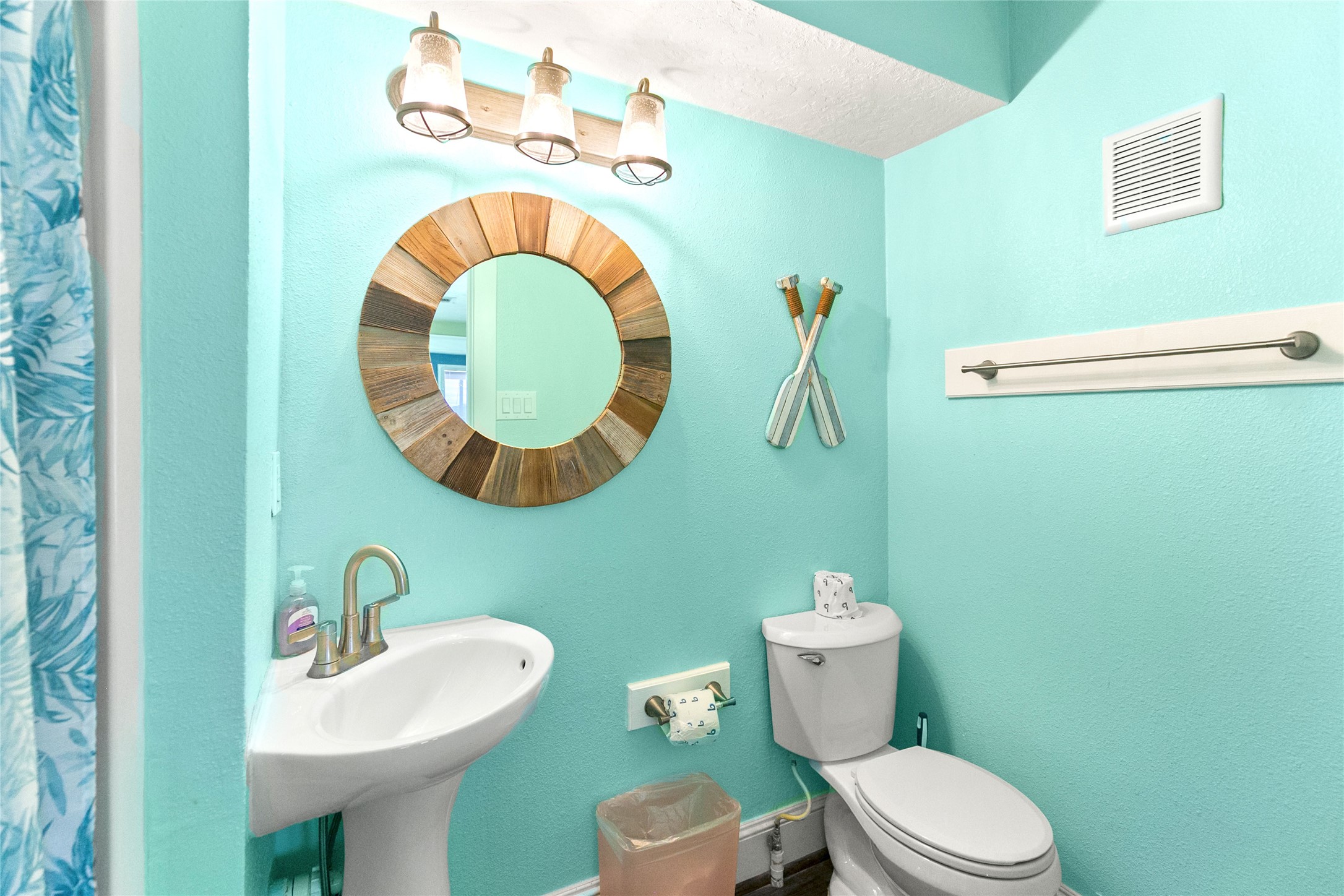 319 Pompano Lane Surfside Beach, TX 77541 - Photo 22 of 48 a bathroom with a sink mirror and toilet