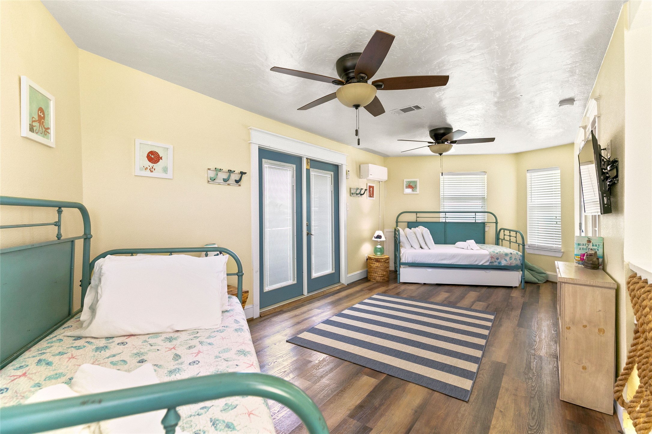 319 Pompano Lane Surfside Beach, TX 77541 - Photo 24 of 48 a bedroom with a bed and window