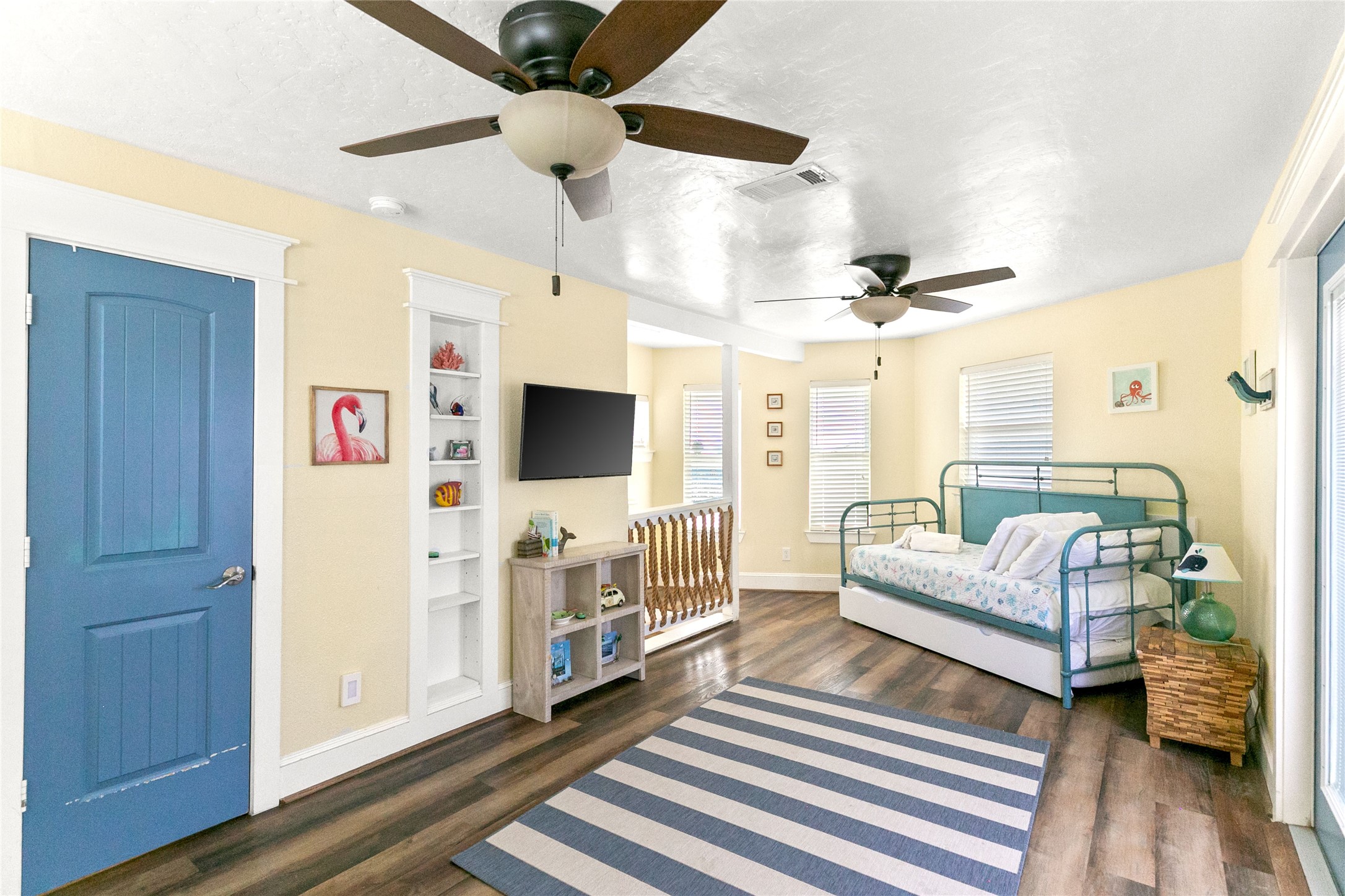 319 Pompano Lane Surfside Beach, TX 77541 - Photo 26 of 48 a living room with furniture and a flat screen tv