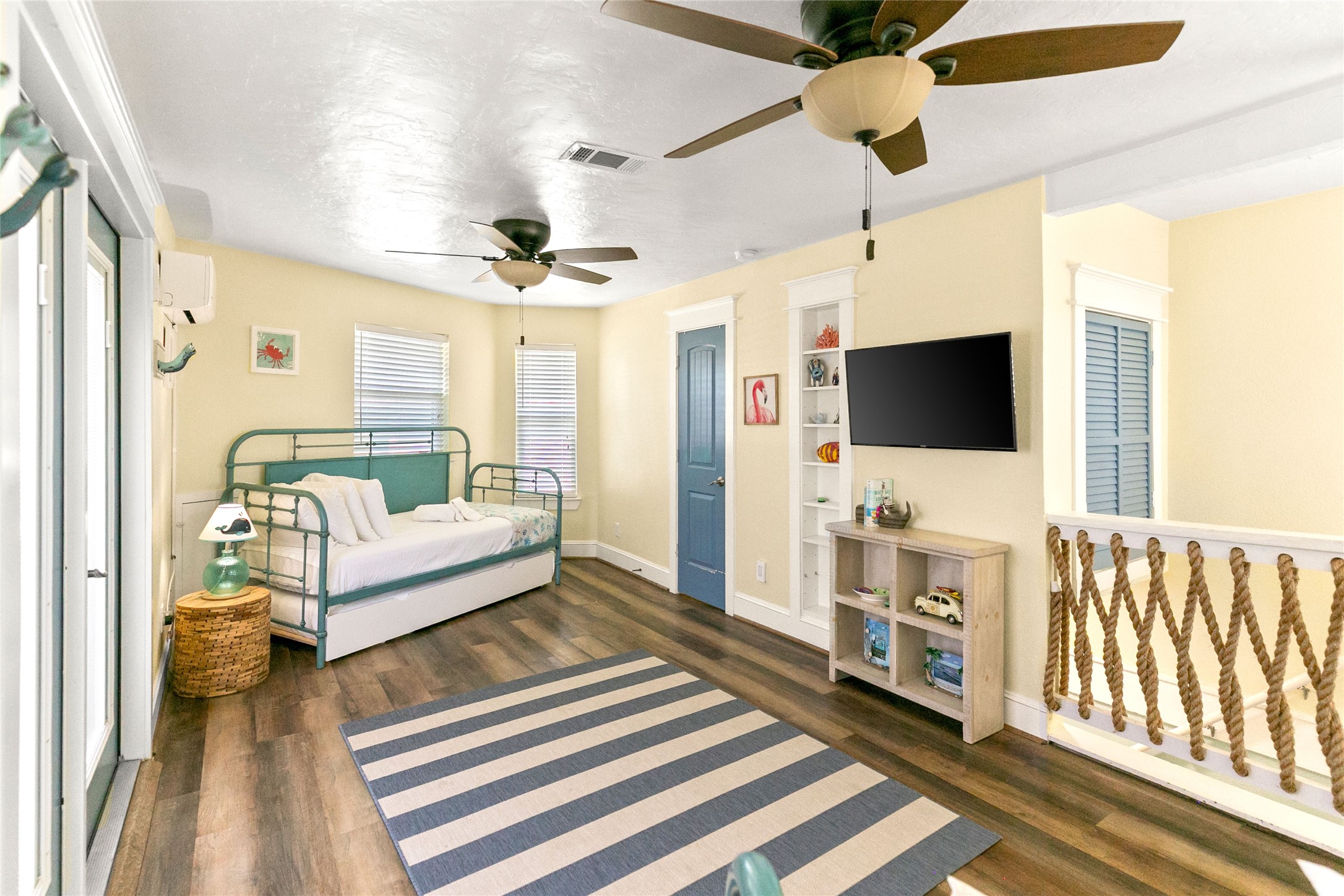 319 Pompano Lane Surfside Beach, TX 77541 - Photo 27 of 48 a living room with furniture and a flat screen tv