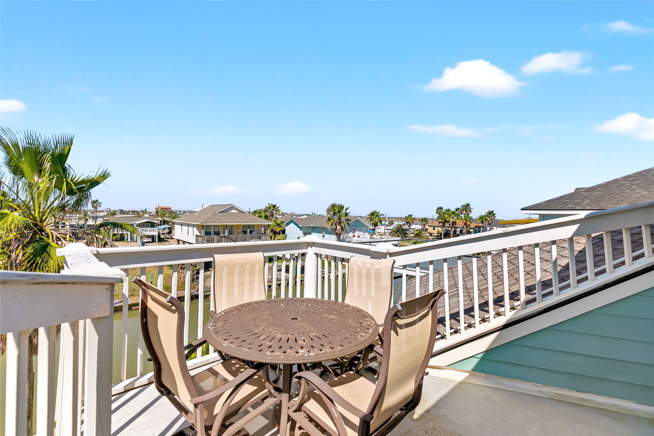 319 Pompano Lane Surfside Beach, TX 77541 - Photo 30 of 48 a view of a balcony with furniture