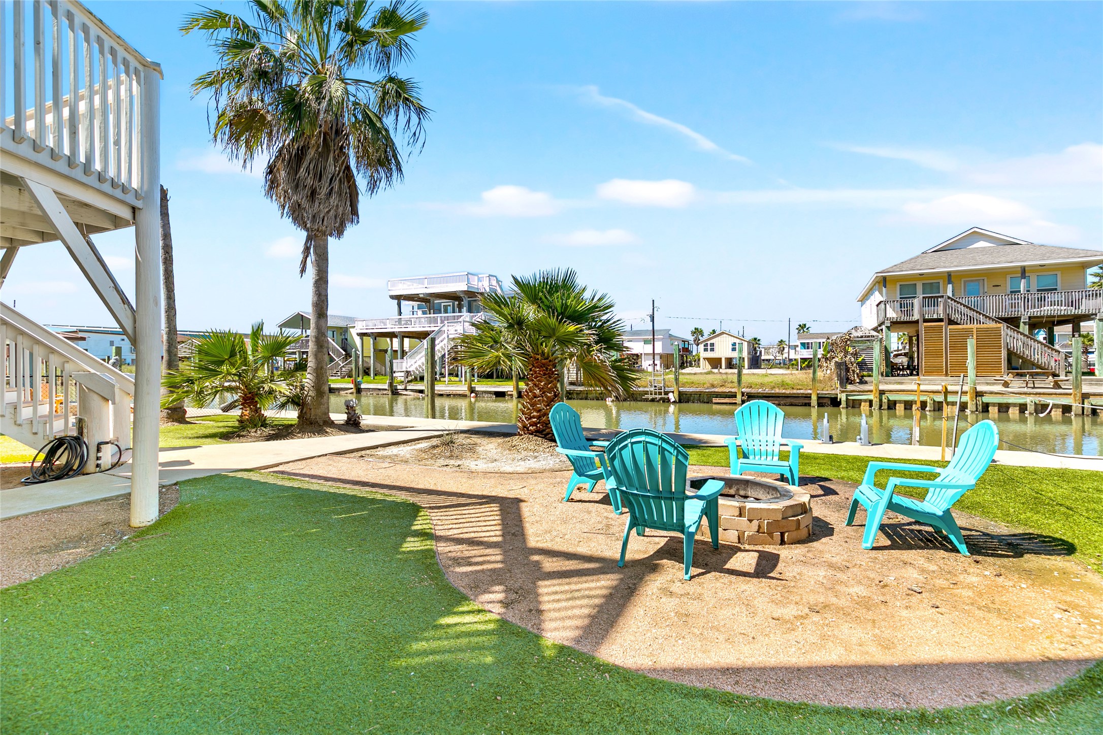 319 Pompano Lane Surfside Beach, TX 77541 - Photo 3 of 48 a swimming pool with outdoor seating and yard