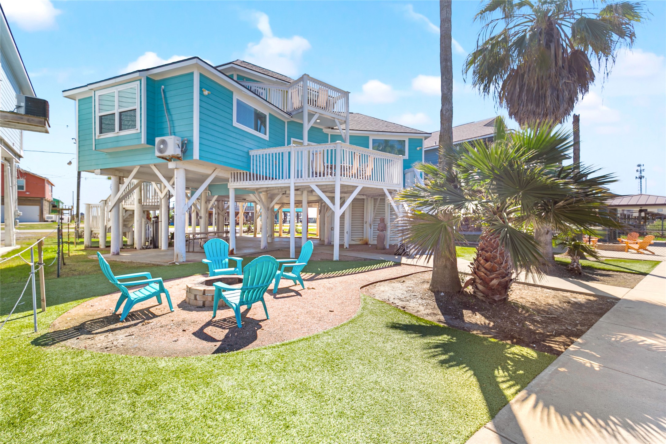 319 Pompano Lane Surfside Beach, TX 77541 - Photo 40 of 48 a view of a yard with swimming pool