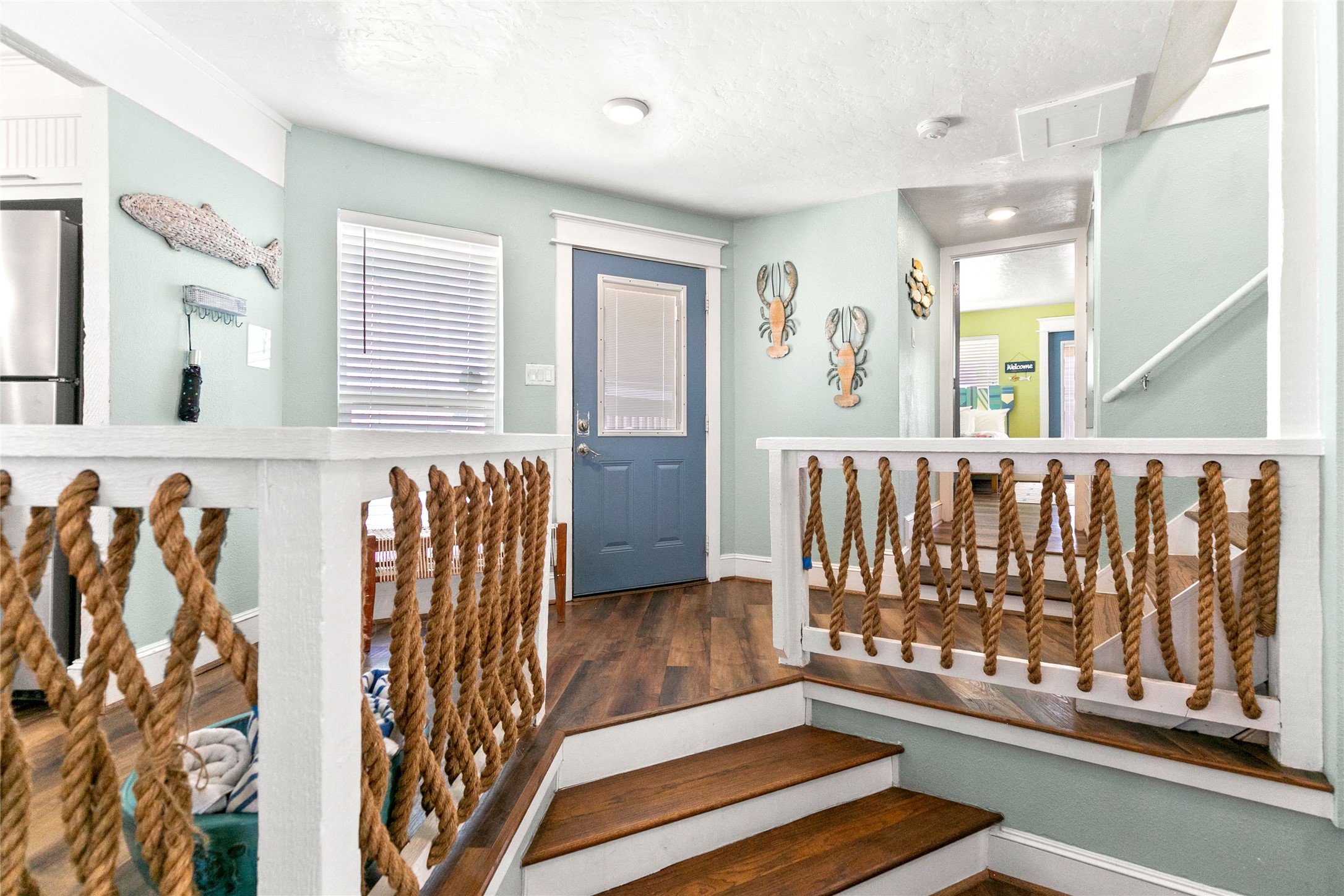 319 Pompano Lane Surfside Beach, TX 77541 - Photo 6 of 48 a view of front door with chair