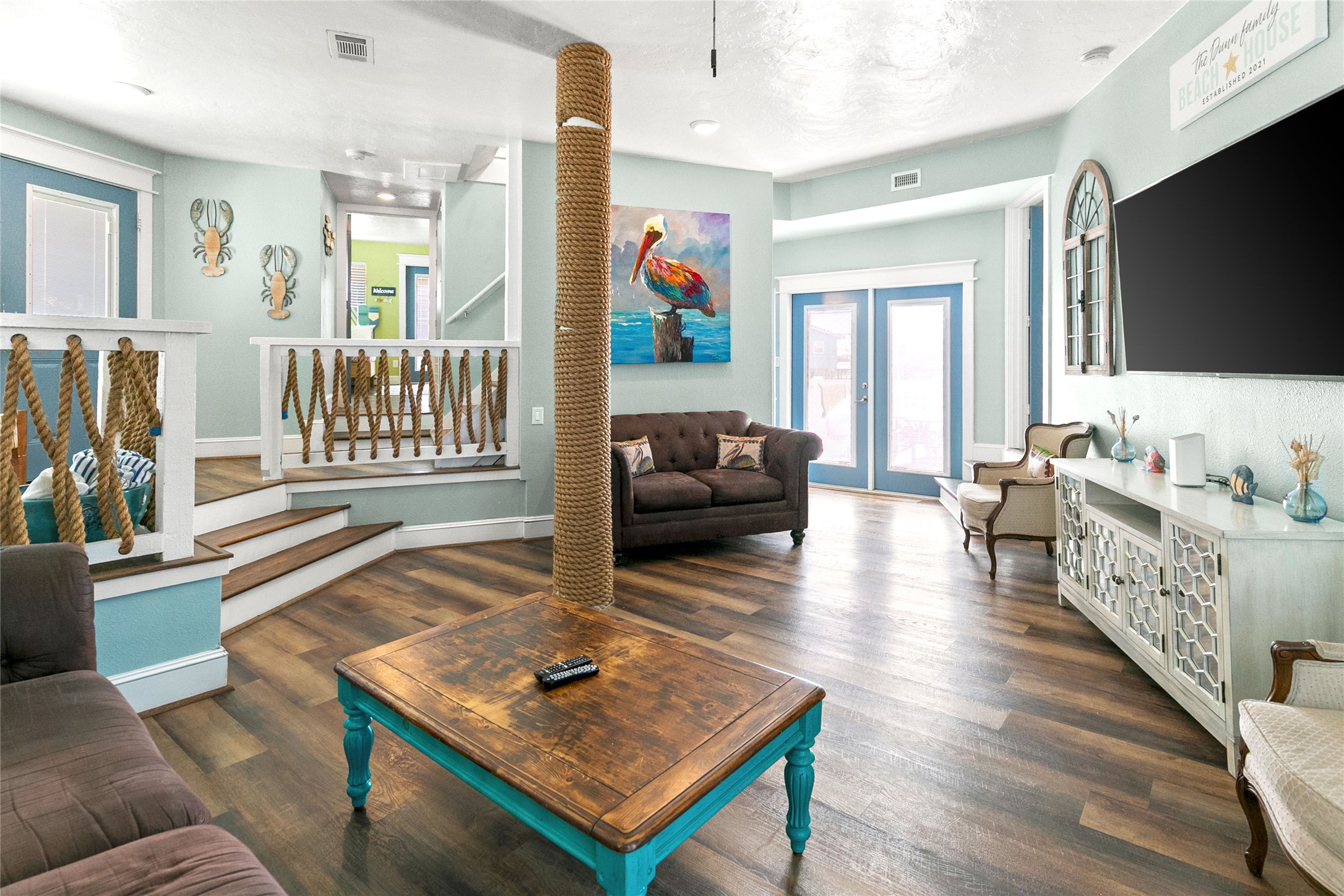 319 Pompano Lane Surfside Beach, TX 77541 - Photo 9 of 48 a living room with furniture and a flat screen tv