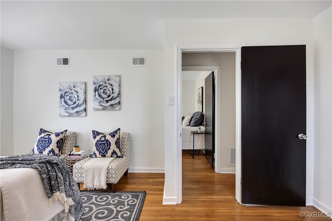 2601 Brook Road Richmond, VA 23220 - Photo 17 of 28 Living area with baseboards, visible vents, and wo