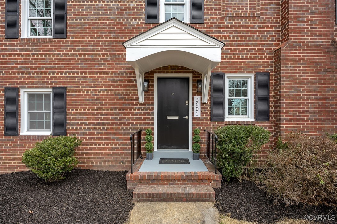 2601 Brook Road Richmond, VA 23220 - Photo 2 of 28 Doorway to property with brick siding