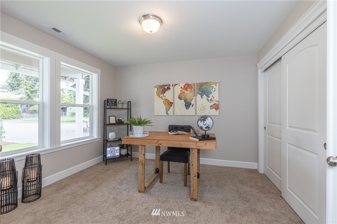 613 Index Avenue Northeast Renton, WA 98056 - Photo 4 of 32 a work room with furniture and a window