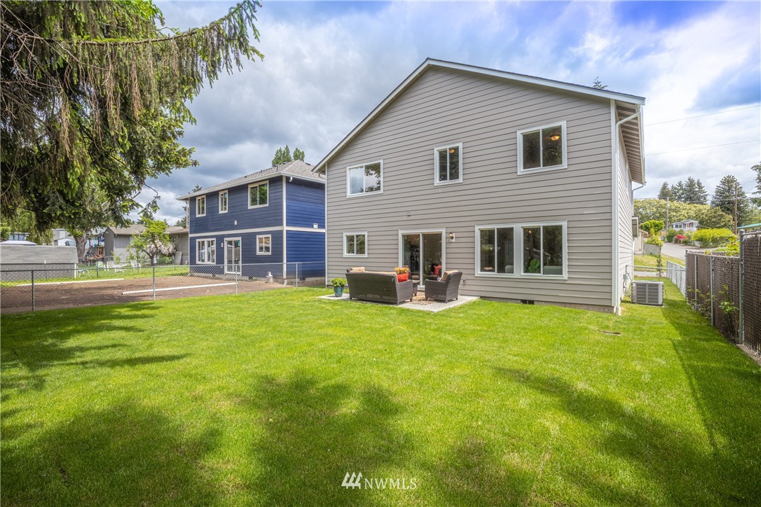 613 Index Avenue Northeast Renton, WA 98056 - Photo 31 of 32 a front view of a house with a yard