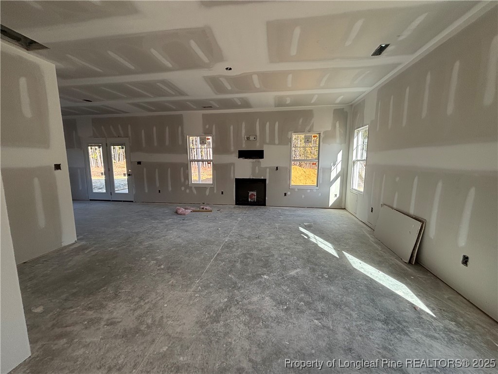 2918 Calloway Road Raeford, NC 28376 - Photo 5 of 13 a view of a livingroom with a fireplace