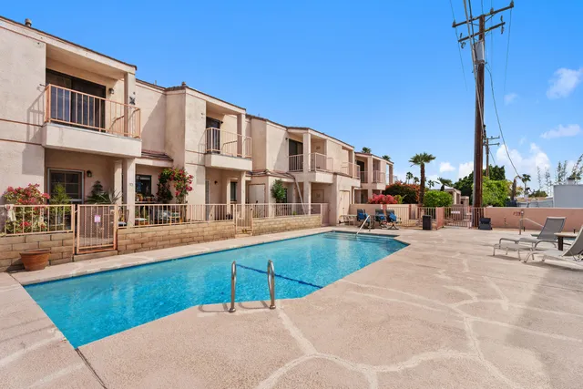 a view of a building with a swimming pool