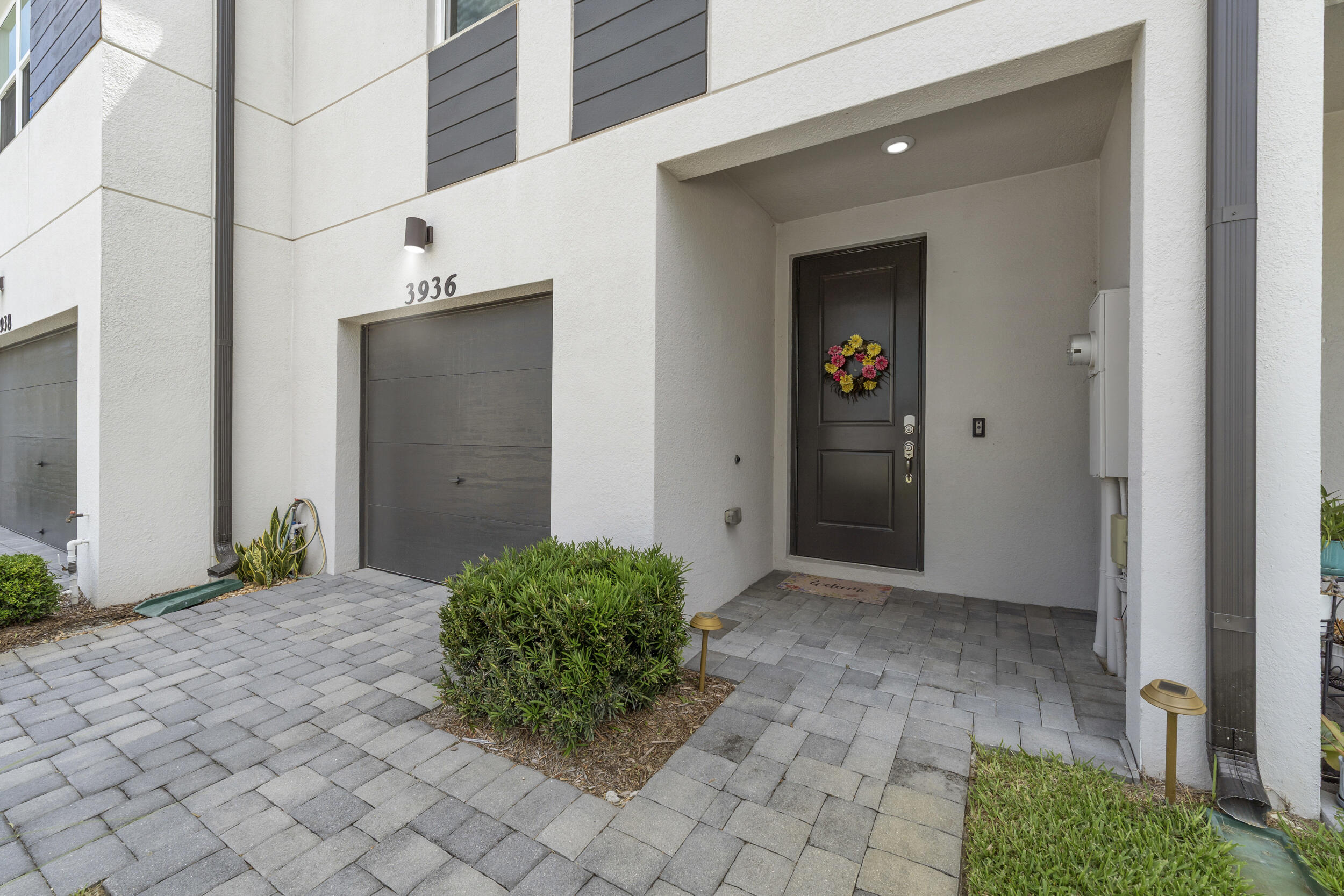 3936 Southeast Caladium Court, Unit 3936 Stuart, FL 34997 - Photo 2 of 32 Covered Entryway
