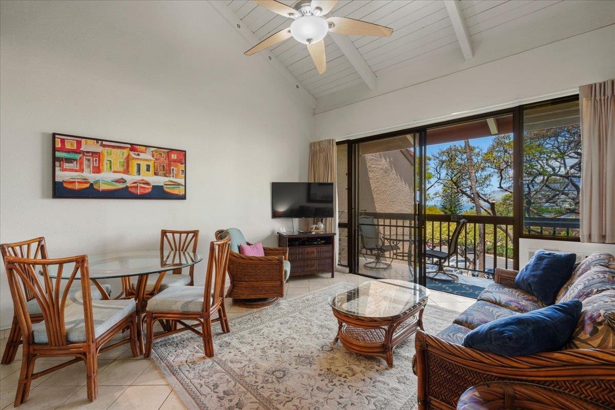 2191 South Kihei Road, Unit 2419 Kihei, HI 96753 - Photo 11 of 27 a living room with furniture and a large window