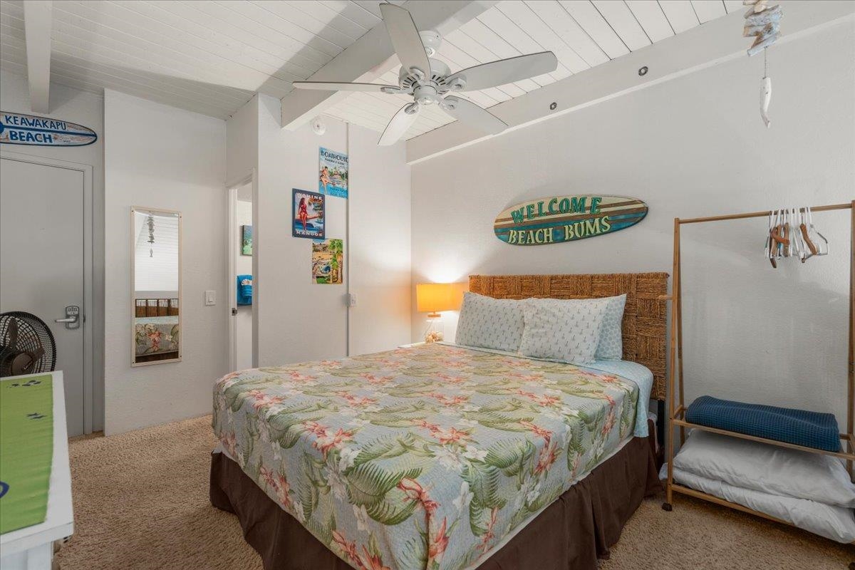 2191 South Kihei Road, Unit 2419 Kihei, HI 96753 - Photo 24 of 27 a bedroom with a bed and a walk in closet