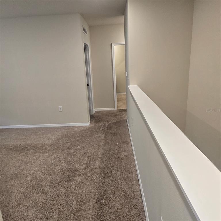 814 Sun Burst Road Winter Haven, FL 33880 - Photo 7 of 48 a view of hallway with shower