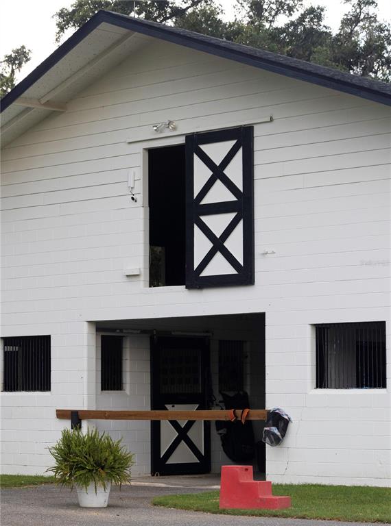 12750 Highway 40 Ocala, FL 34481 - Photo 13 of 43 a front view of a house with yard