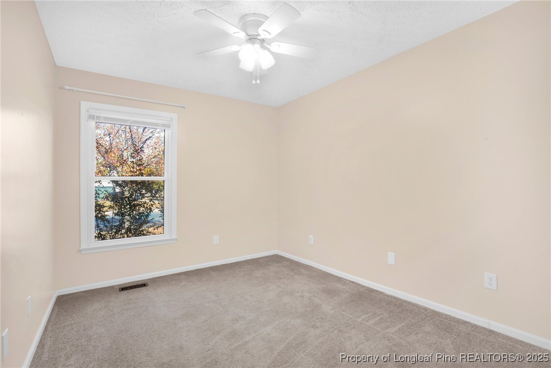 101 2 Hours Court Raeford, NC 28376 - Photo 18 of 30 an empty room with a window
