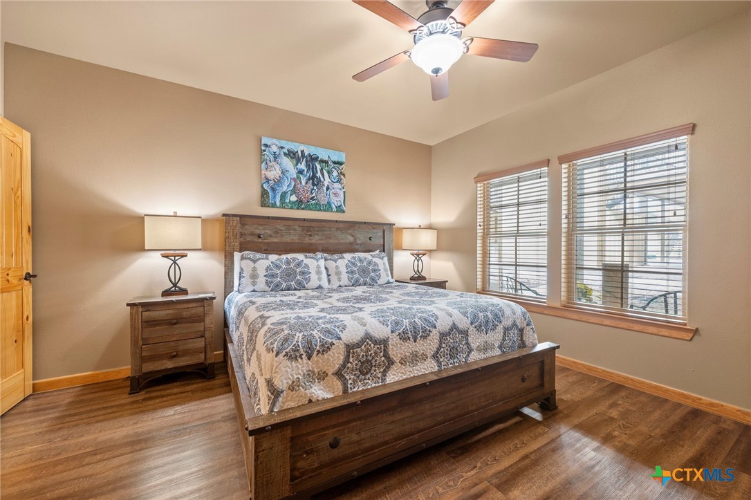 1554 Gruene Road, Unit A10 New Braunfels, TX 78130 - Photo 16 of 32 a bedroom with a bed and a window
