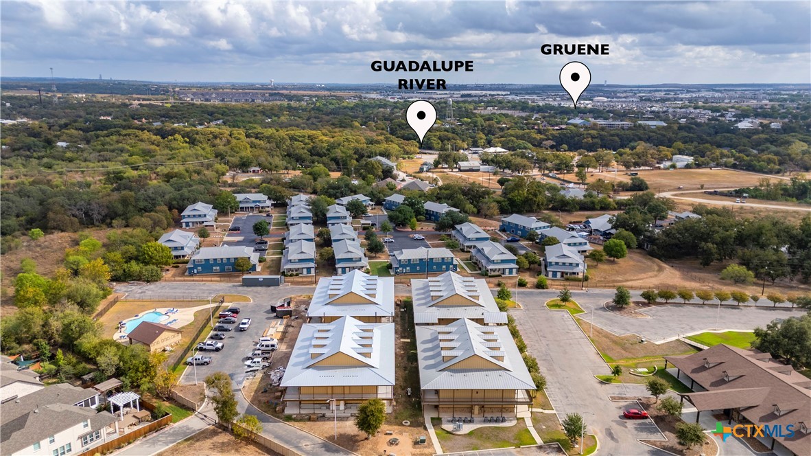 1554 Gruene Road, Unit A10 New Braunfels, TX 78130 - Photo 29 of 32 an aerial view of a city with lots of residential buildings