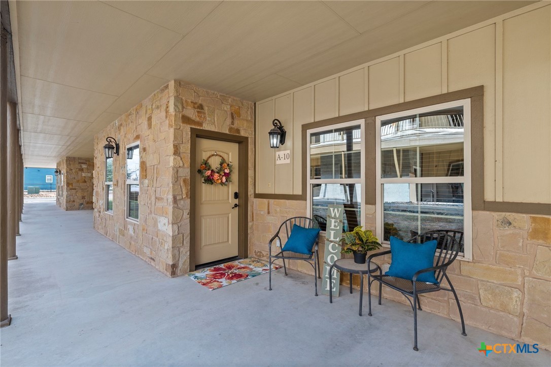 1554 Gruene Road, Unit A10 New Braunfels, TX 78130 - Photo 3 of 32 a view of livingroom with furniture and windows