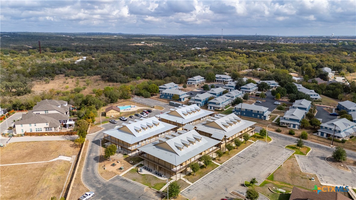 1554 Gruene Road, Unit A10 New Braunfels, TX 78130 - Photo 31 of 32 an aerial view of a residential houses with outdoor space