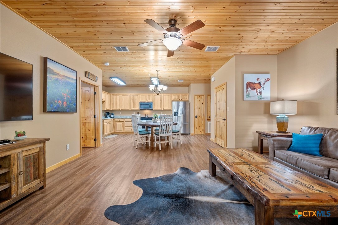 1554 Gruene Road, Unit A10 New Braunfels, TX 78130 - Photo 4 of 32 a living room with furniture and wooden floor