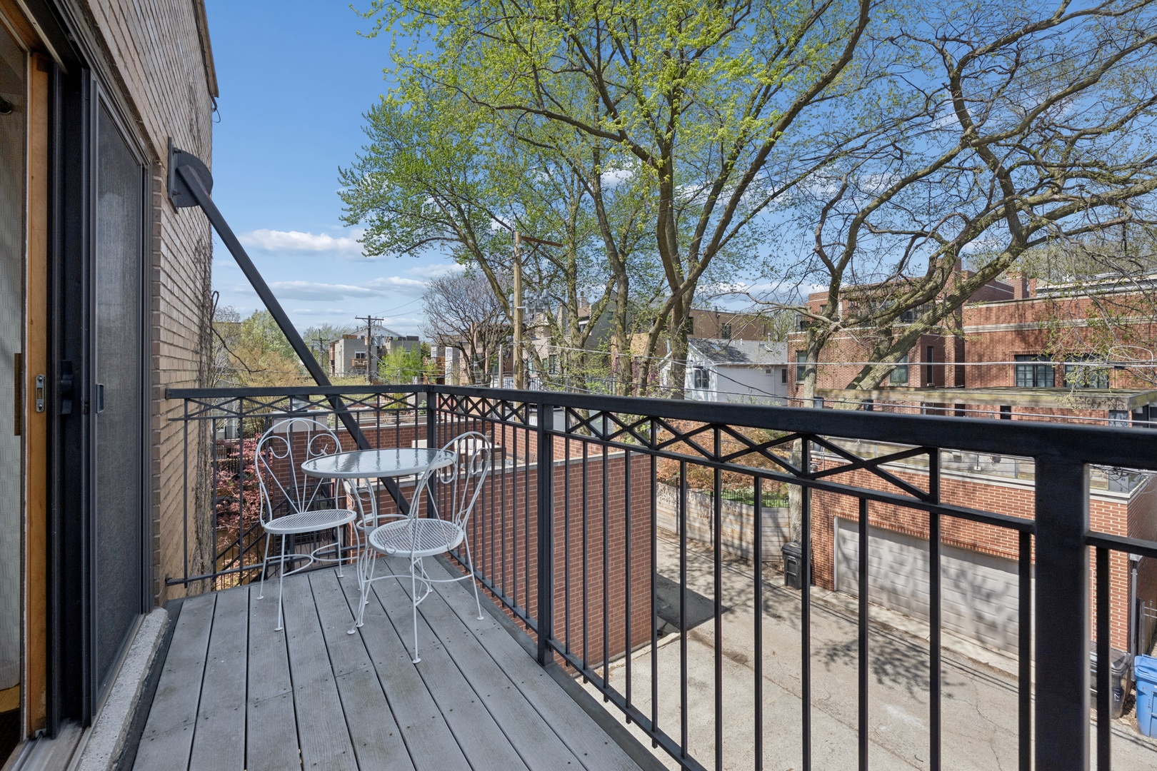 1122 West Altgeld Street, Unit 12 Chicago, IL 60614 - Photo 18 of 20 a view of balcony with wooden floor and fence