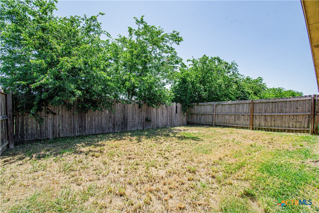 3104 Baldwin Loop, Unit A Killeen, TX 76549 - Photo 19 of 19 a view of wooden fence in the backyard