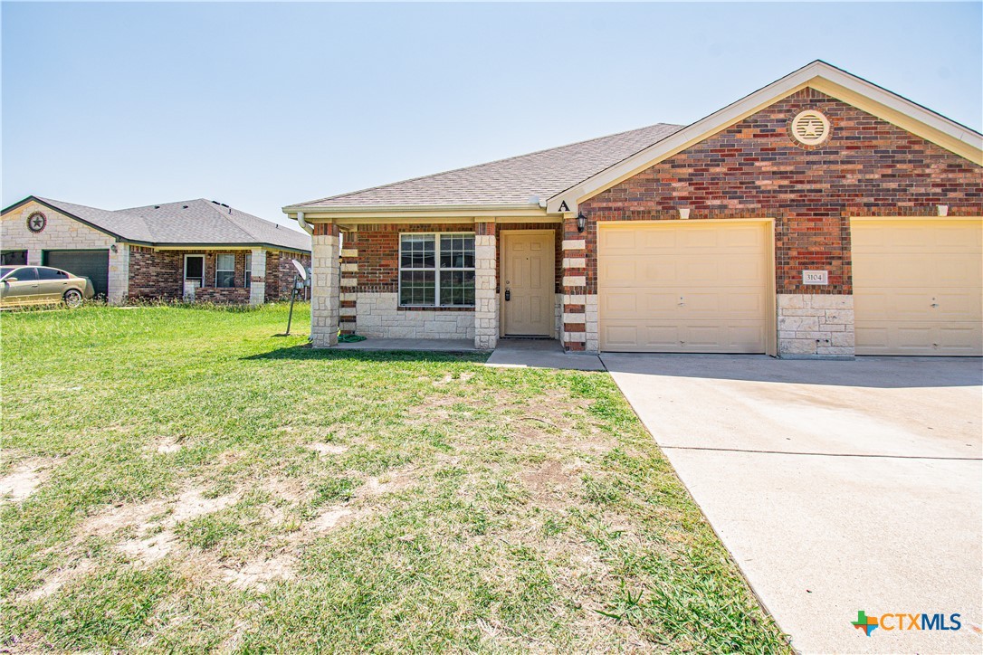 3104 Baldwin Loop, Unit A Killeen, TX 76549 - Photo 2 of 19 a view of front a house with a yard