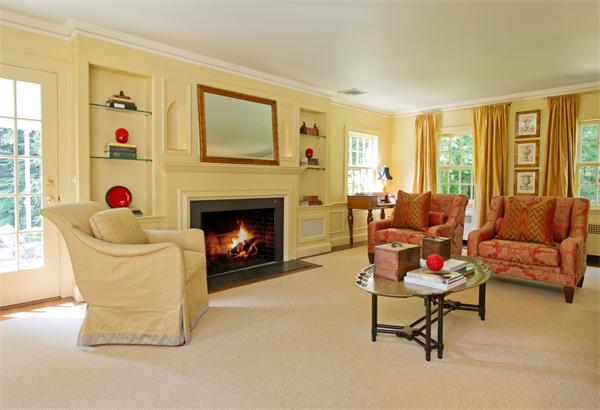 94 Oxbow Road Weston, MA 02493 - Photo 10 of 19 a living room with furniture and a fireplace