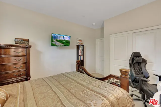 a view of kitchen center island and stainless steel appliances