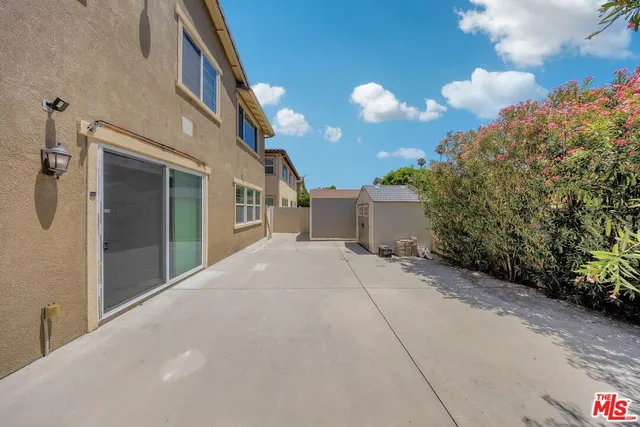 a house view with a outdoor space
