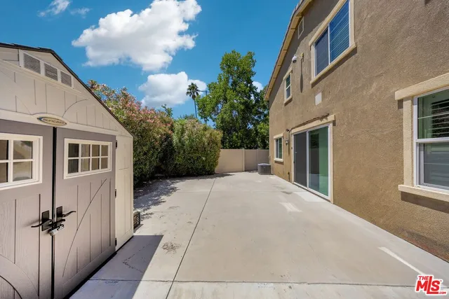 a house view with a outdoor space