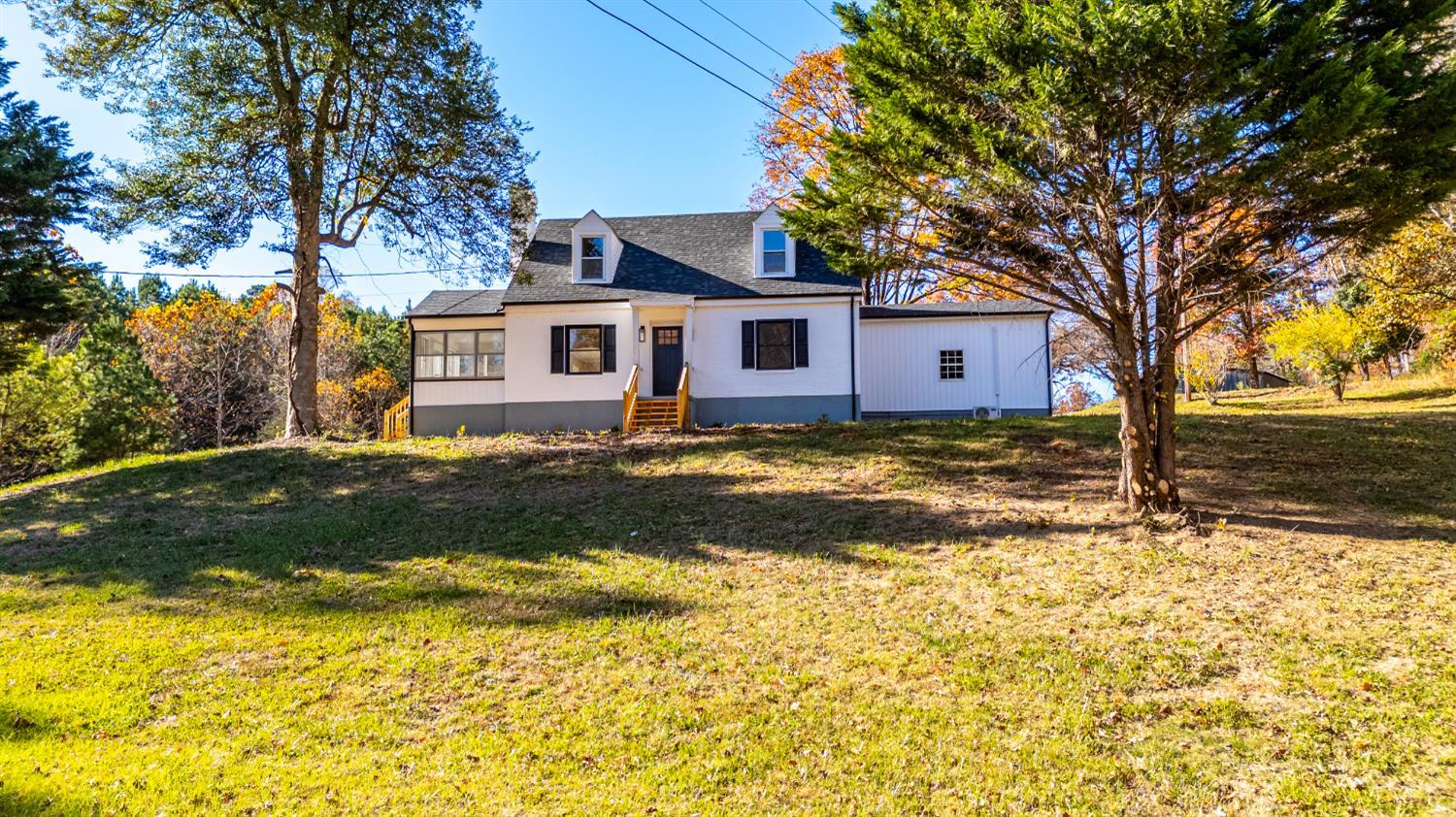 1612 South Amherst Highway Amherst, VA 24521 - Photo 32 of 48 a view of a house with a yard