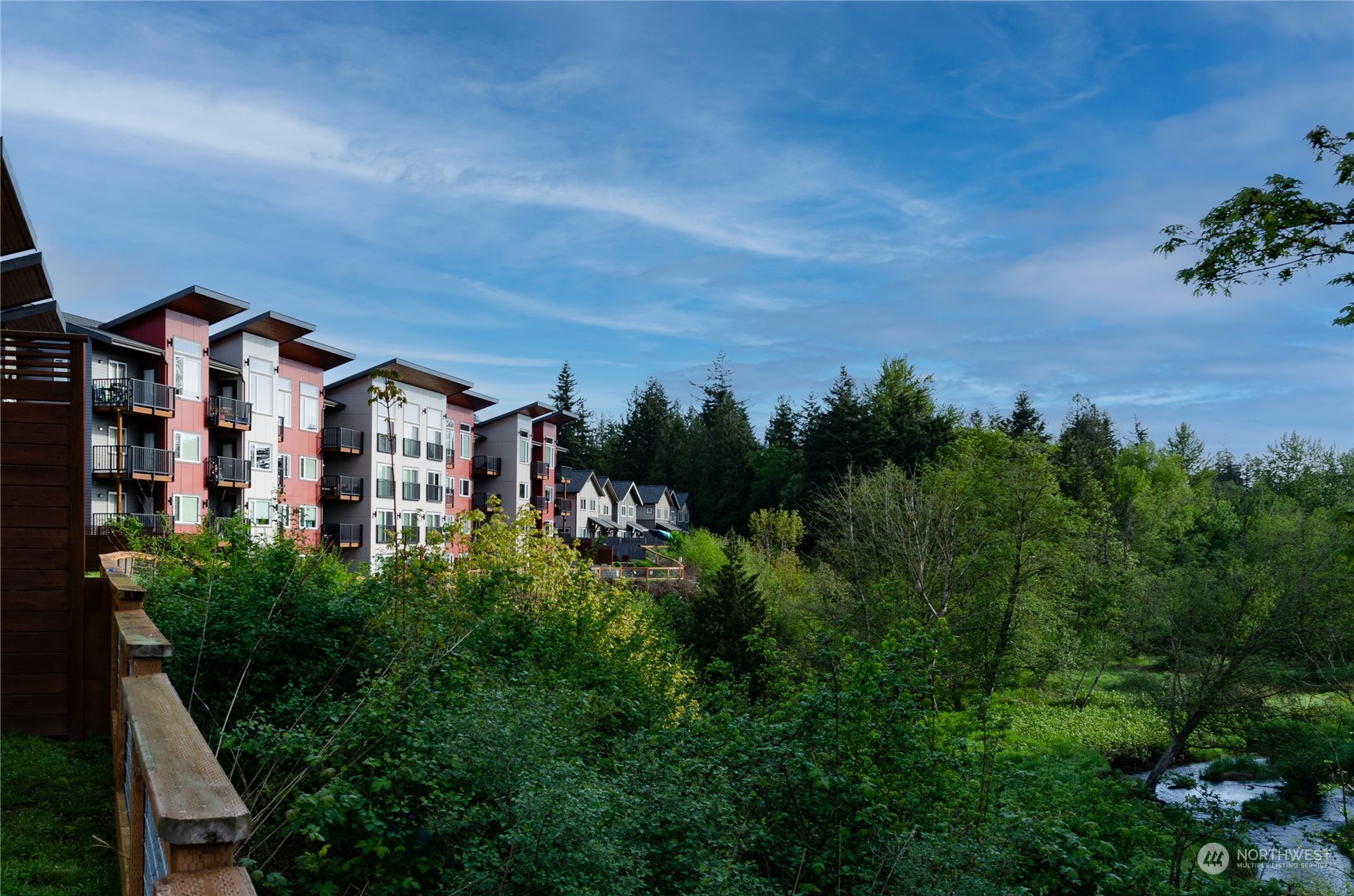 1882 Front Street, Unit 208 Lynden, WA 98264 - Photo 1 of 30 a front view of a house with a yard