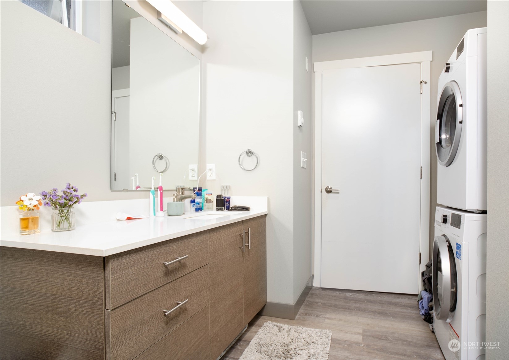 1882 Front Street, Unit 208 Lynden, WA 98264 - Photo 15 of 30 a bathroom with a sink vanity and a mirror