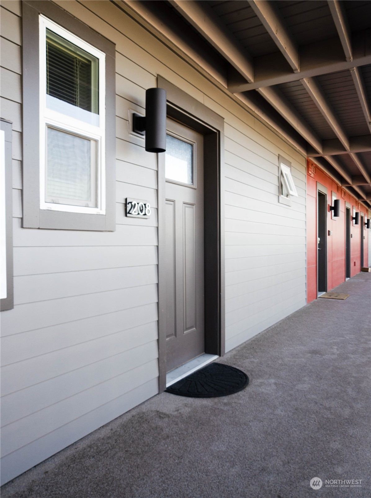 1882 Front Street, Unit 208 Lynden, WA 98264 - Photo 21 of 30 a view of a house with an entryway door