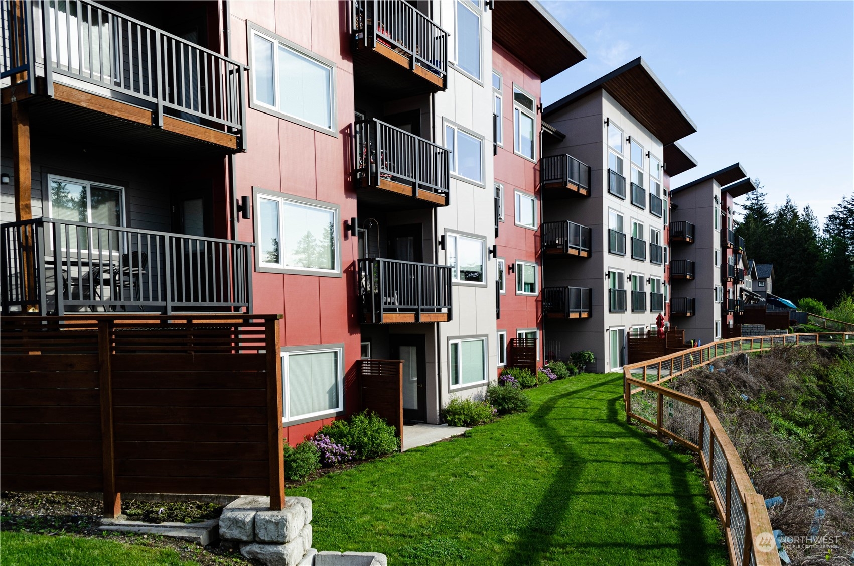 1882 Front Street, Unit 208 Lynden, WA 98264 - Photo 23 of 30 a backyard of a house with lots of green space