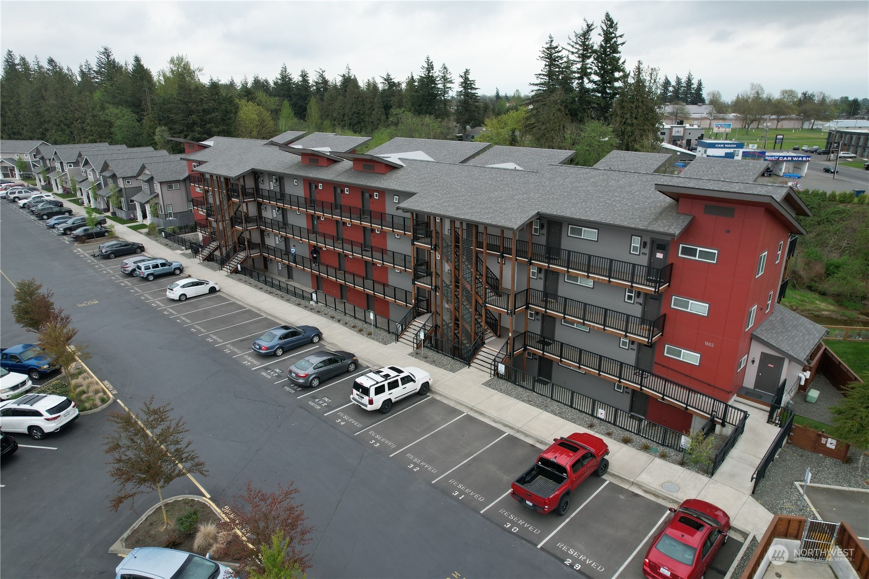 1882 Front Street, Unit 208 Lynden, WA 98264 - Photo 27 of 30 an aerial view of a house with a garden
