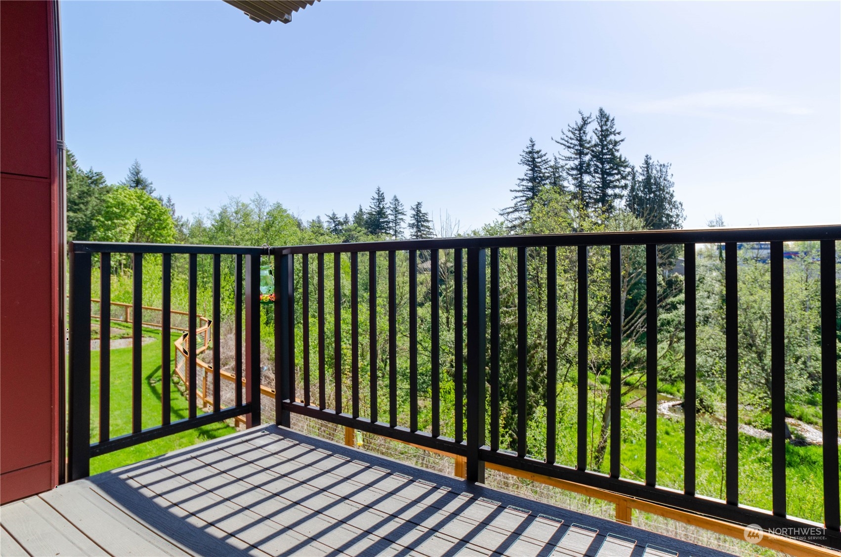 1882 Front Street, Unit 208 Lynden, WA 98264 - Photo 4 of 30 a view of a balcony with wooden floor