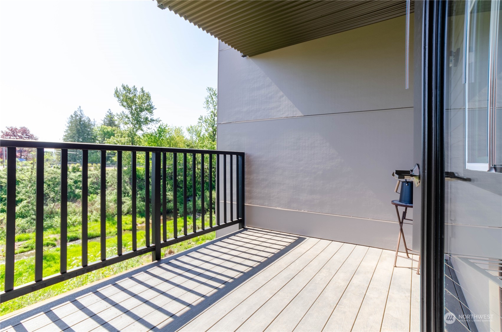 1882 Front Street, Unit 208 Lynden, WA 98264 - Photo 6 of 30 a view of a balcony with wooden floor