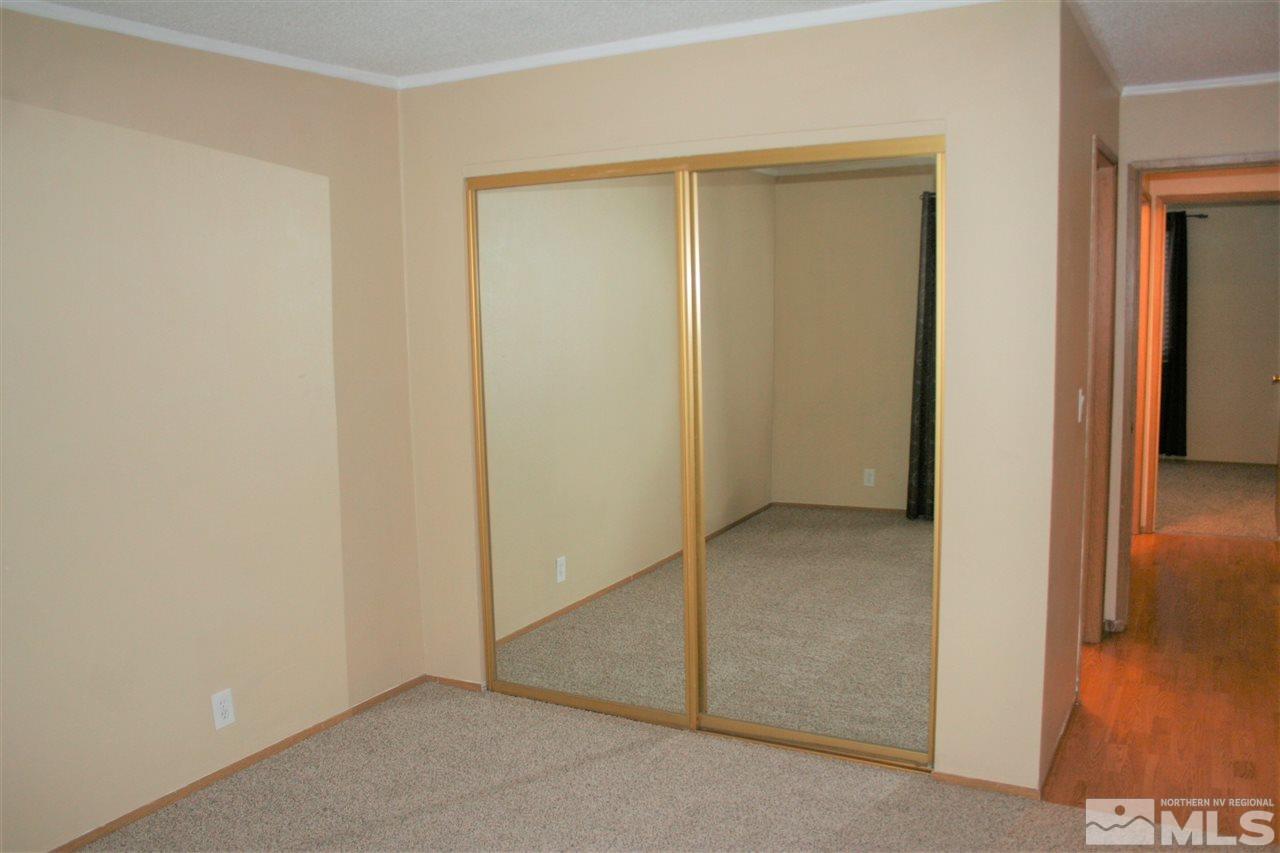 2989 Tierra Verde East Reno, NV 89512 - Photo 12 of 18 an empty room and closet